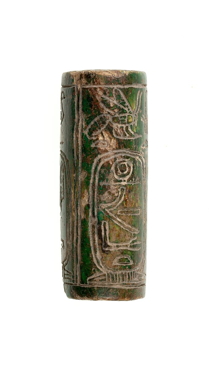 Half of a cylinder seal with names of Amenemhat III, Dark green glazed steatite