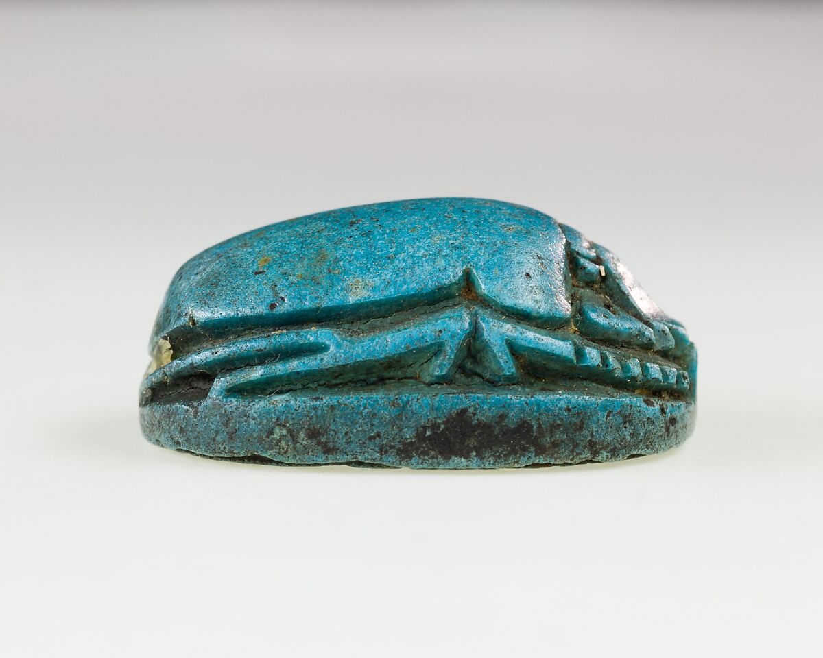 Scarab Inscribed with Hieroglyphs and Symbols, Bright blue glazed steatite