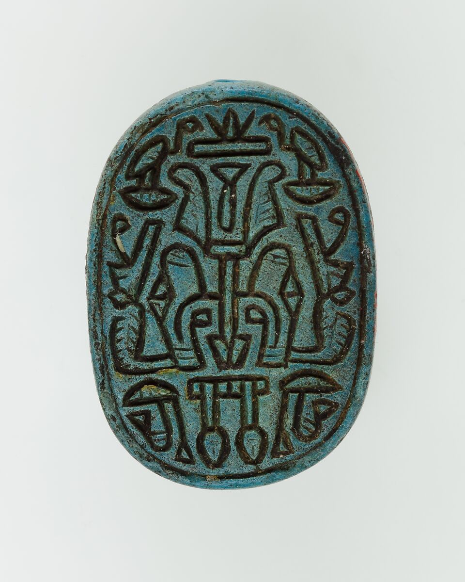 Scarab Inscribed with Hieroglyphs and Symbols, Bright blue glazed steatite 