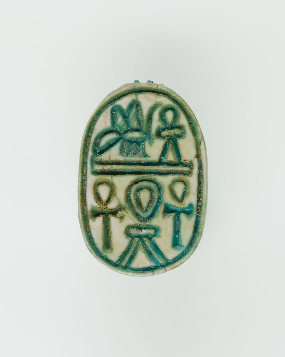 Scarab Inscribed with Hieroglyphs, Bright blue glazed steatite 