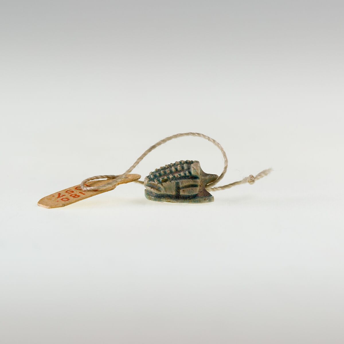 Hedgehog Scaraboid Inscribed with a Blessing Related to Re, Green glazed steatite