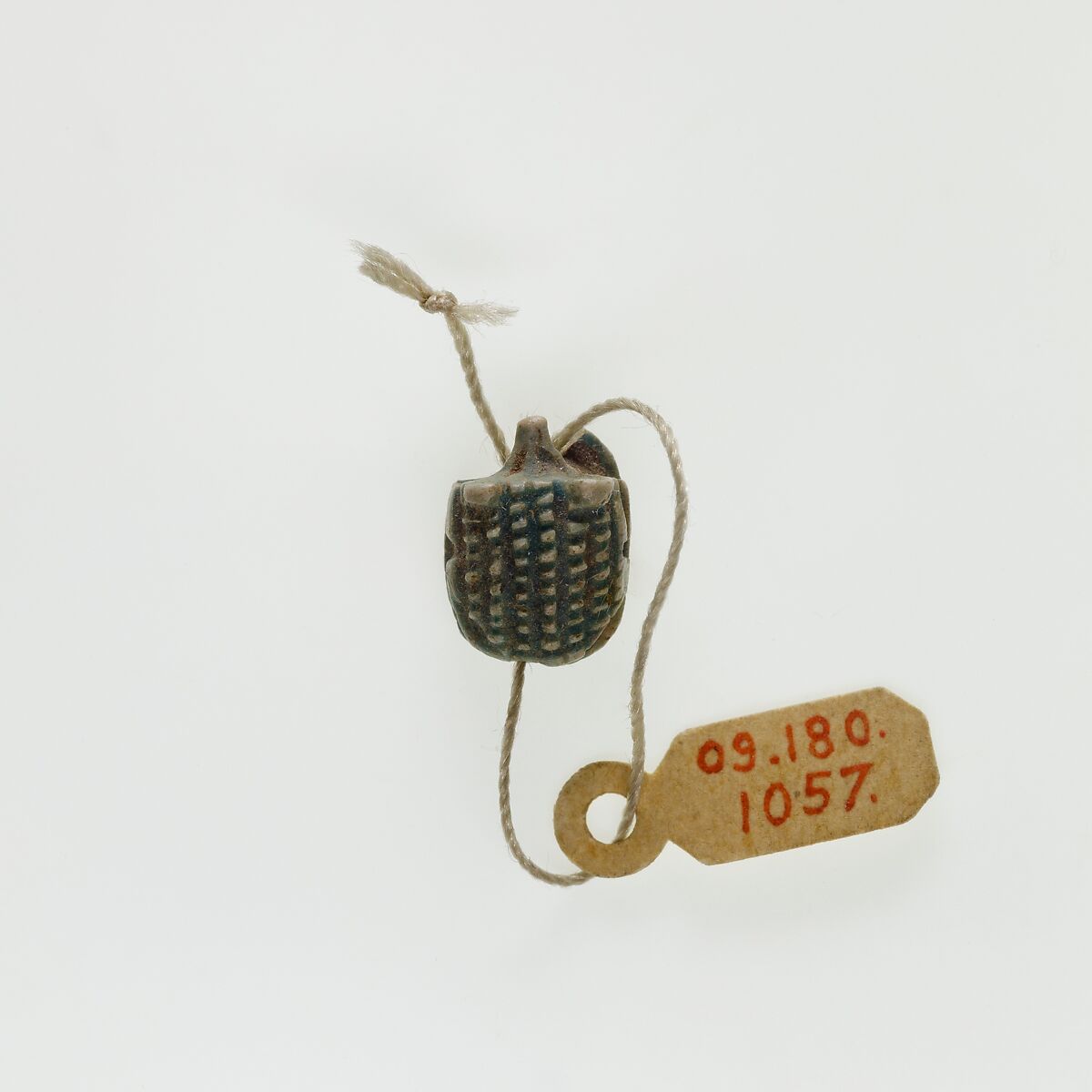 Hedgehog Scaraboid Inscribed with a Blessing Related to Re, Green glazed steatite