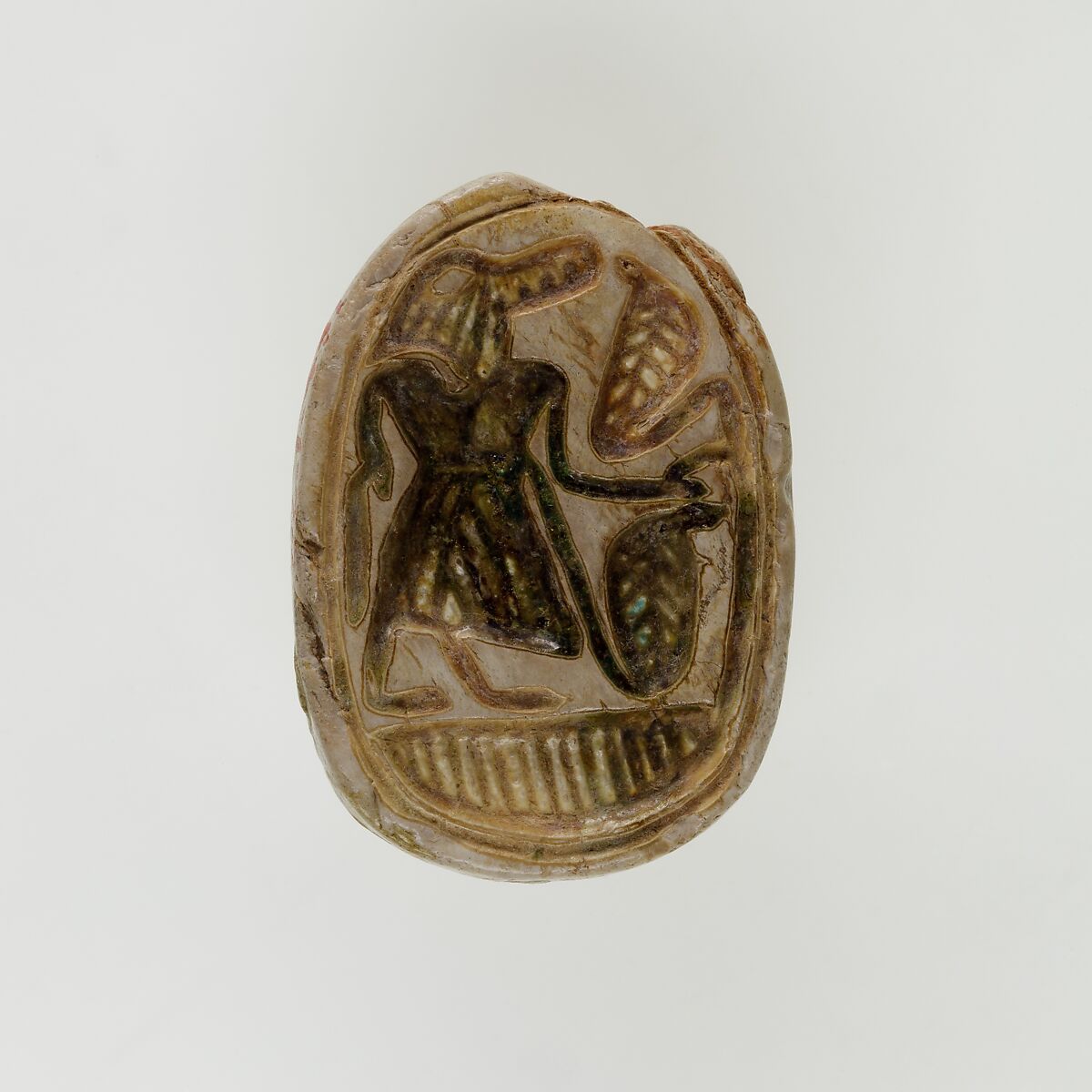 Scarab with Sobek and Uraei, Steatite, traces of green glaze 