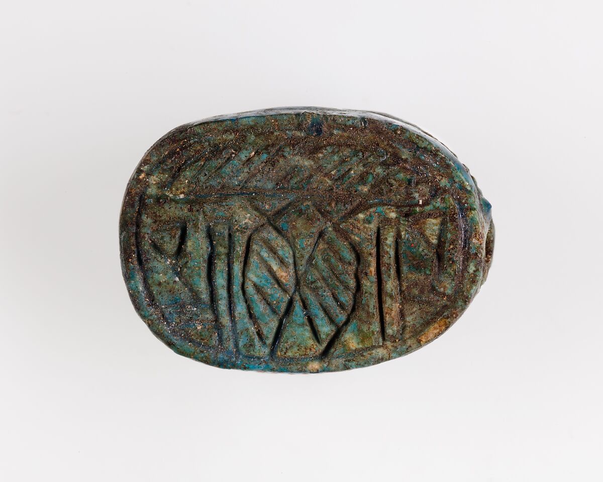 Scarab with Papyrus Motif and Signs, Bright blue glazed steatite 