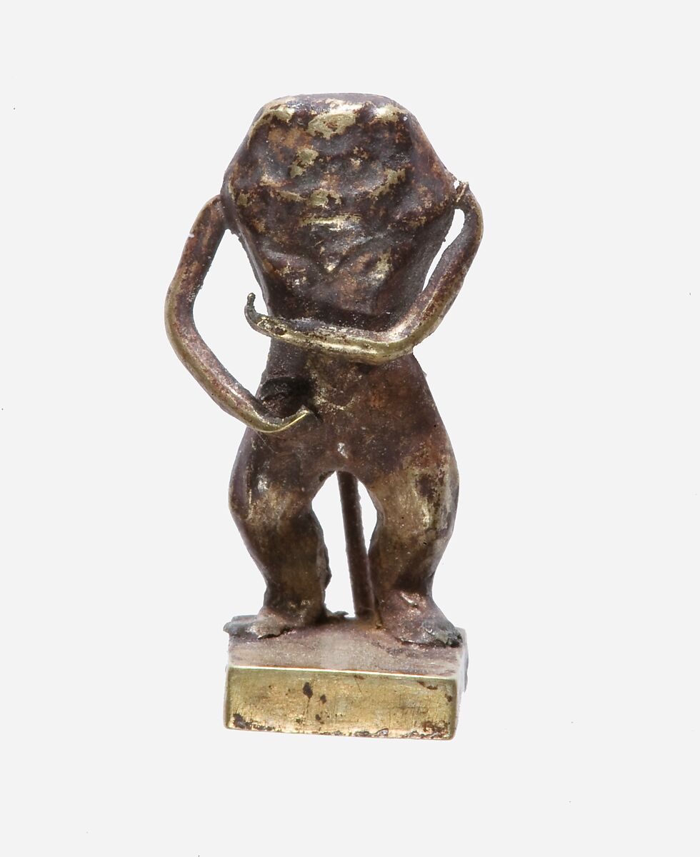 A standing figure of a Bes-image, Gold 