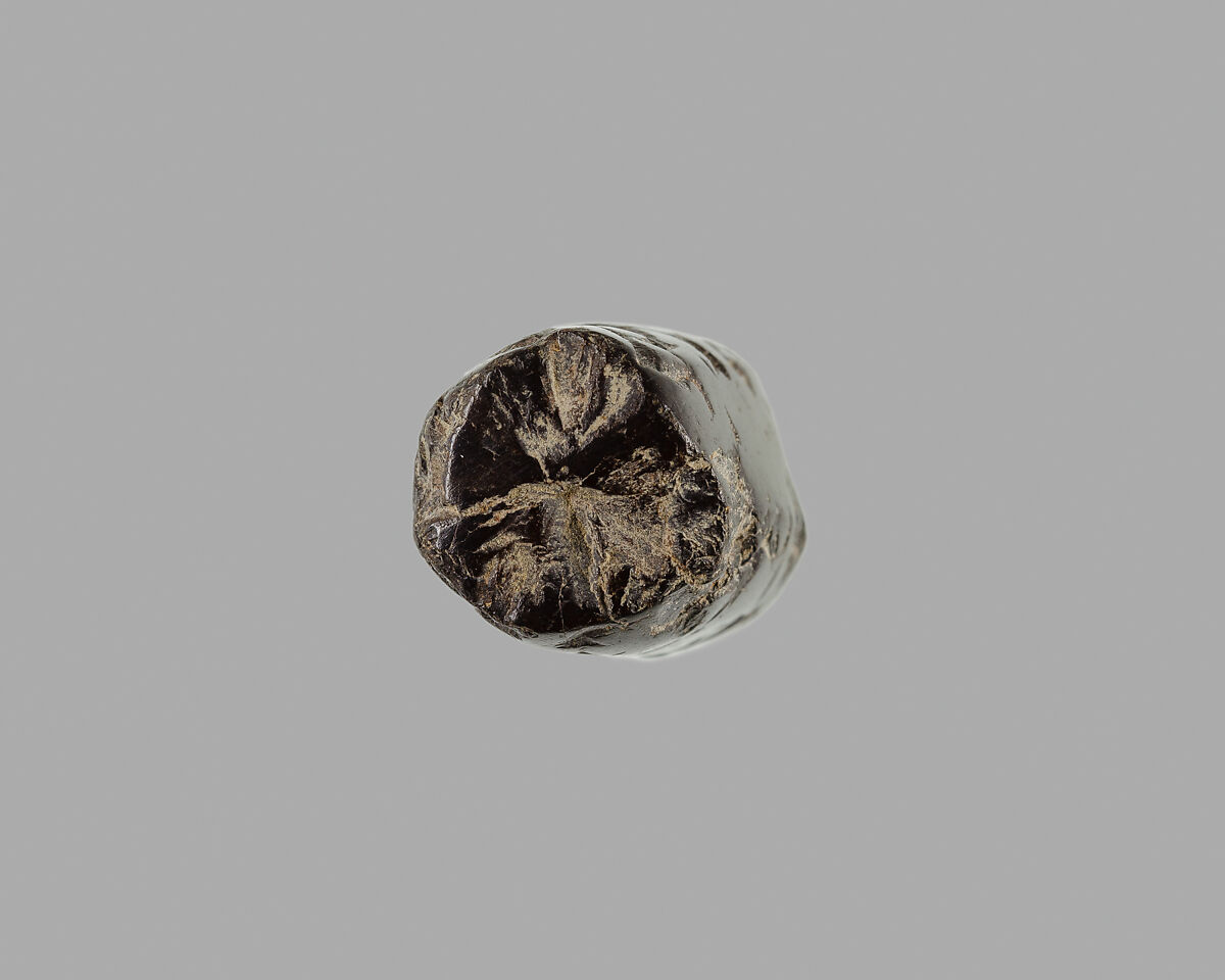 Polygonal cylinder seal; possibly reworked at a later date; possibly inscribed, Hematite