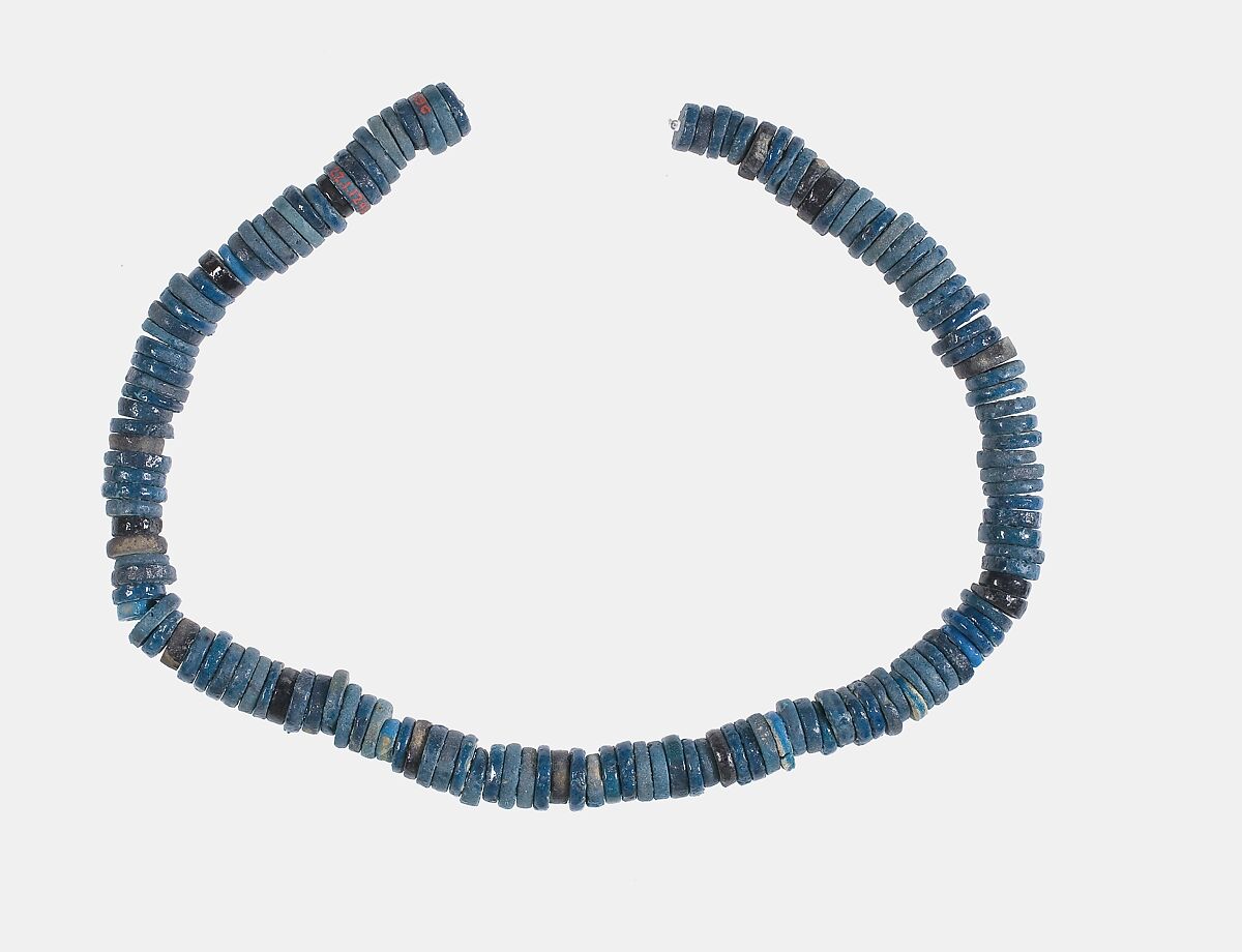 Ring beads on original string, Blue faience 