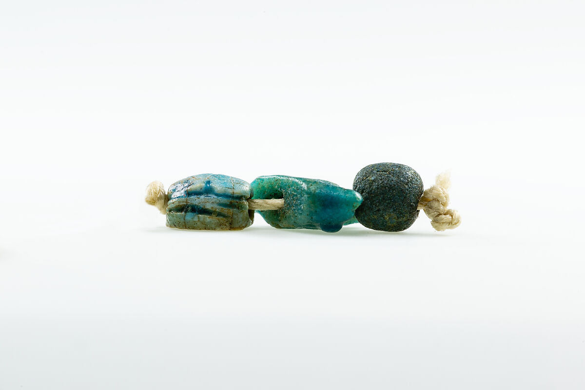 Falcon amulet, Green faience 