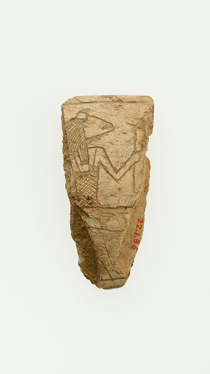 A fragment of a magic wand illustrating a frog headed deity, Ivory