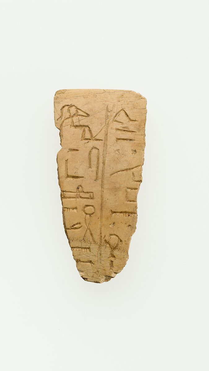 A fragment of a magic wand illustrating a frog headed deity, Ivory 
