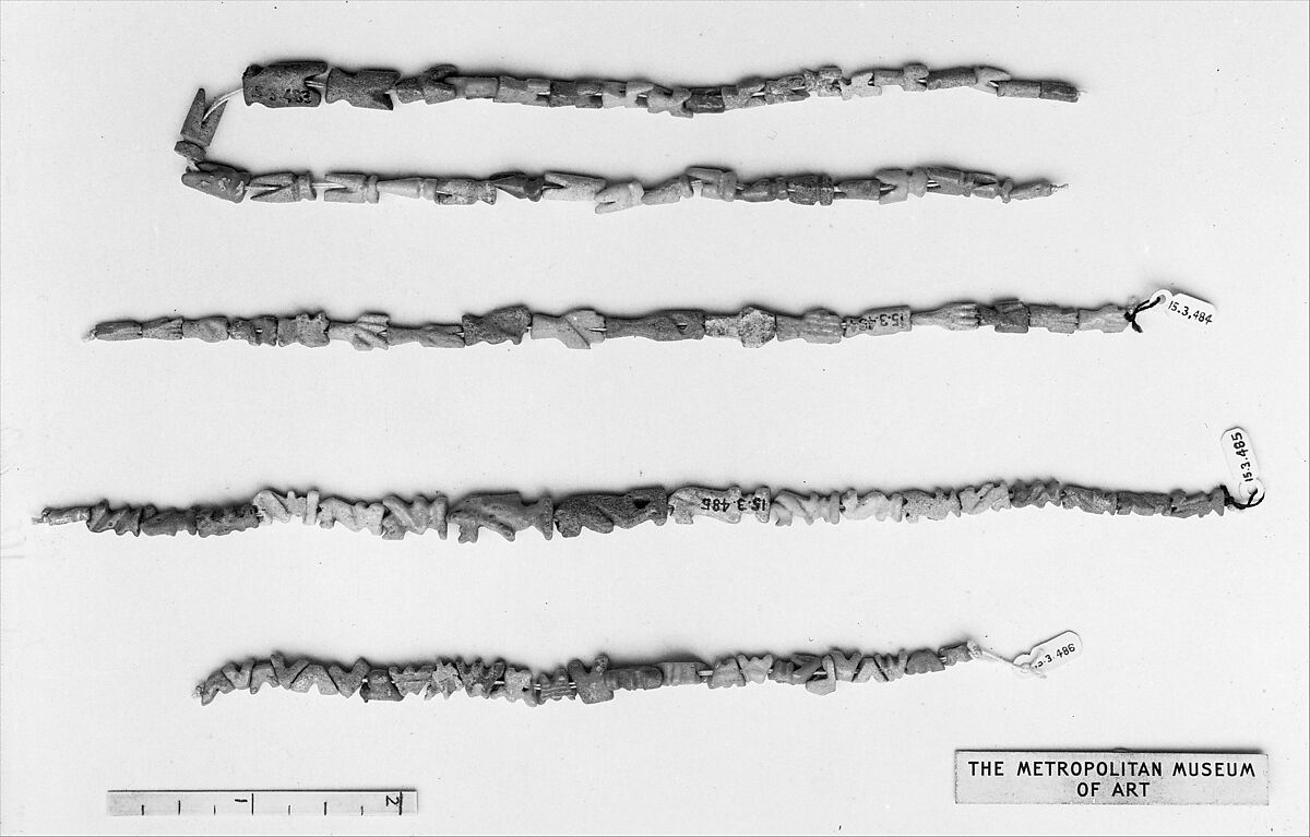 Necklace of amulets, Blue faience