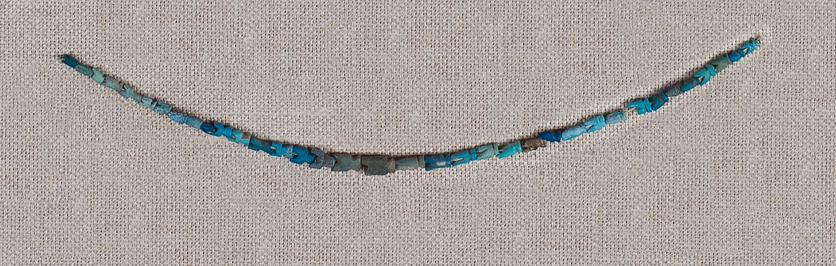 Necklace of amulets, Blue faience 