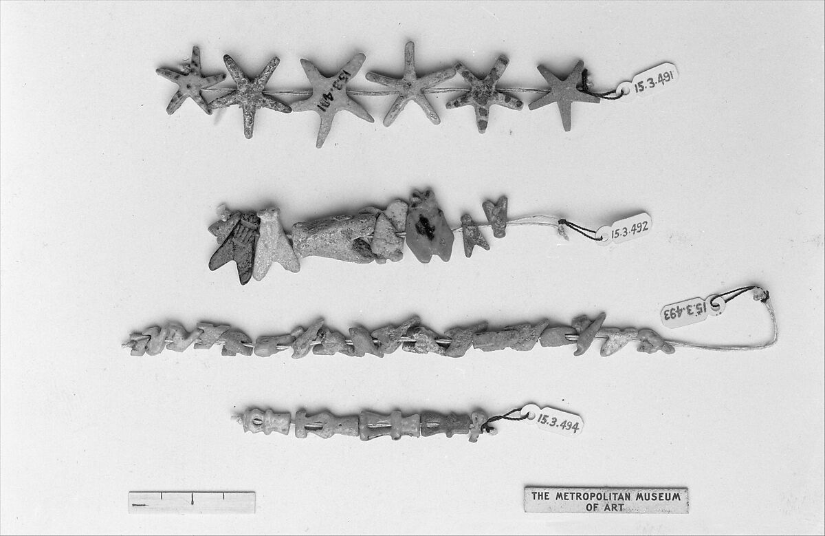 Necklace of amulets, Blue faience