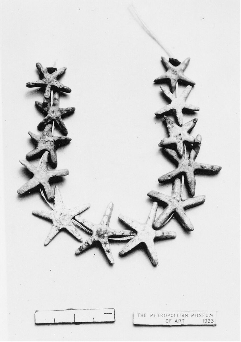 String of star amulets, Blue faience