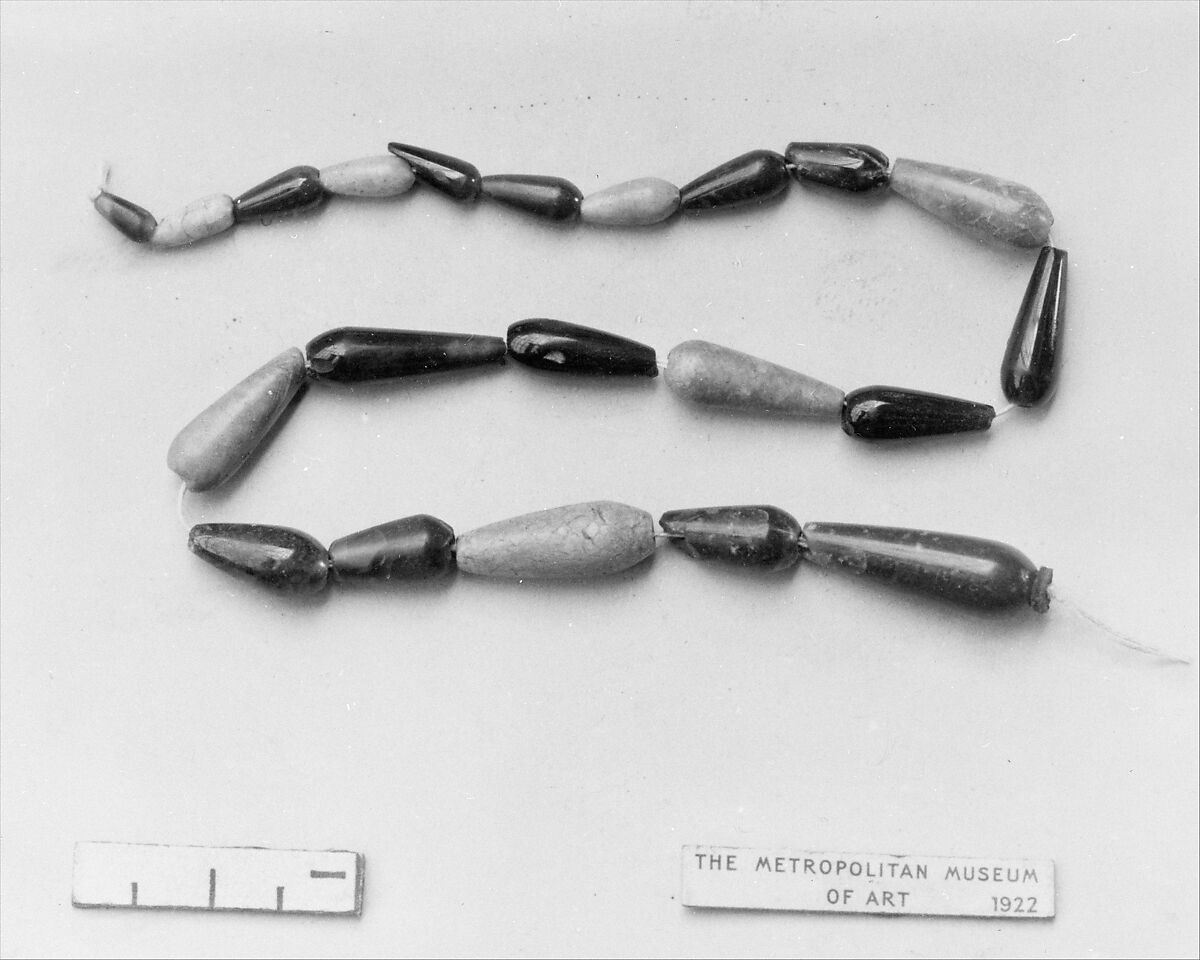 String of carnelian, beryl and steatite drop beads, Carnelian, beryl, steatite