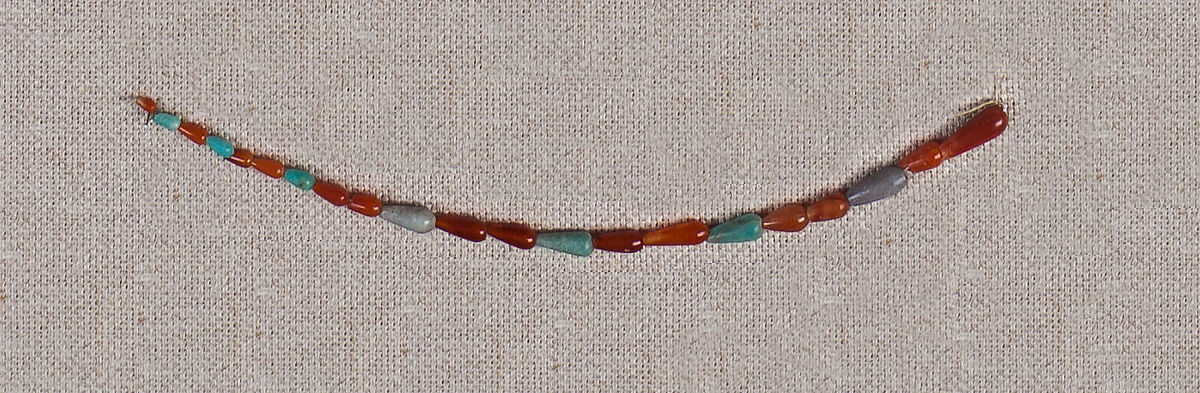 String of carnelian, beryl and steatite drop beads, Carnelian, beryl, steatite 