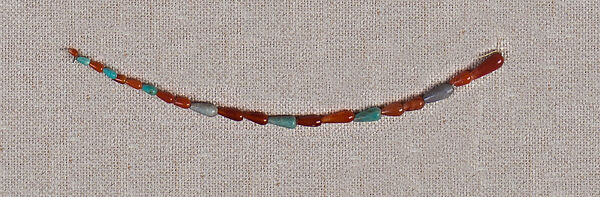 String of carnelian, beryl and steatite drop beads