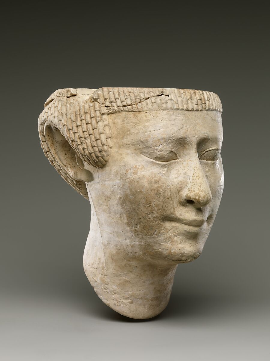 Partial female head, Limestone