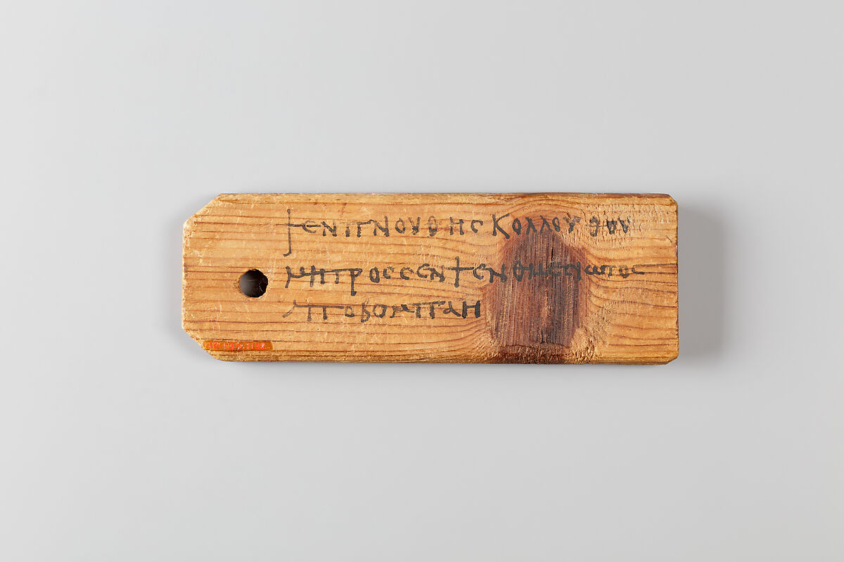 Mummy label of Psenpnouthes, (son of) Kollouthes; his mother Senpsenthmesios, Wood, ink