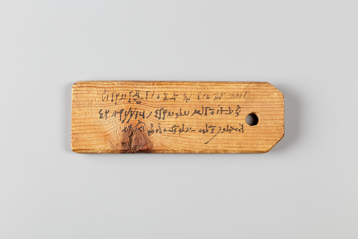 Mummy label of Psenpnouthes, (son of) Kollouthes; his mother Senpsenthmesios, Wood, ink 