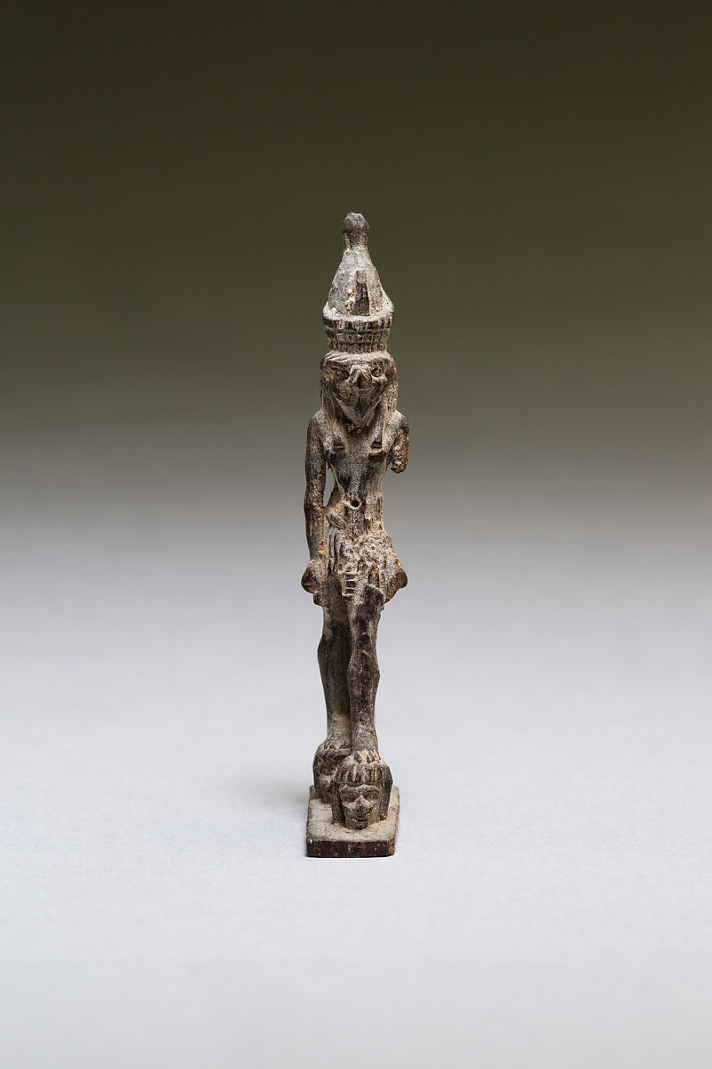 Horus standing on two captives' heads, wood