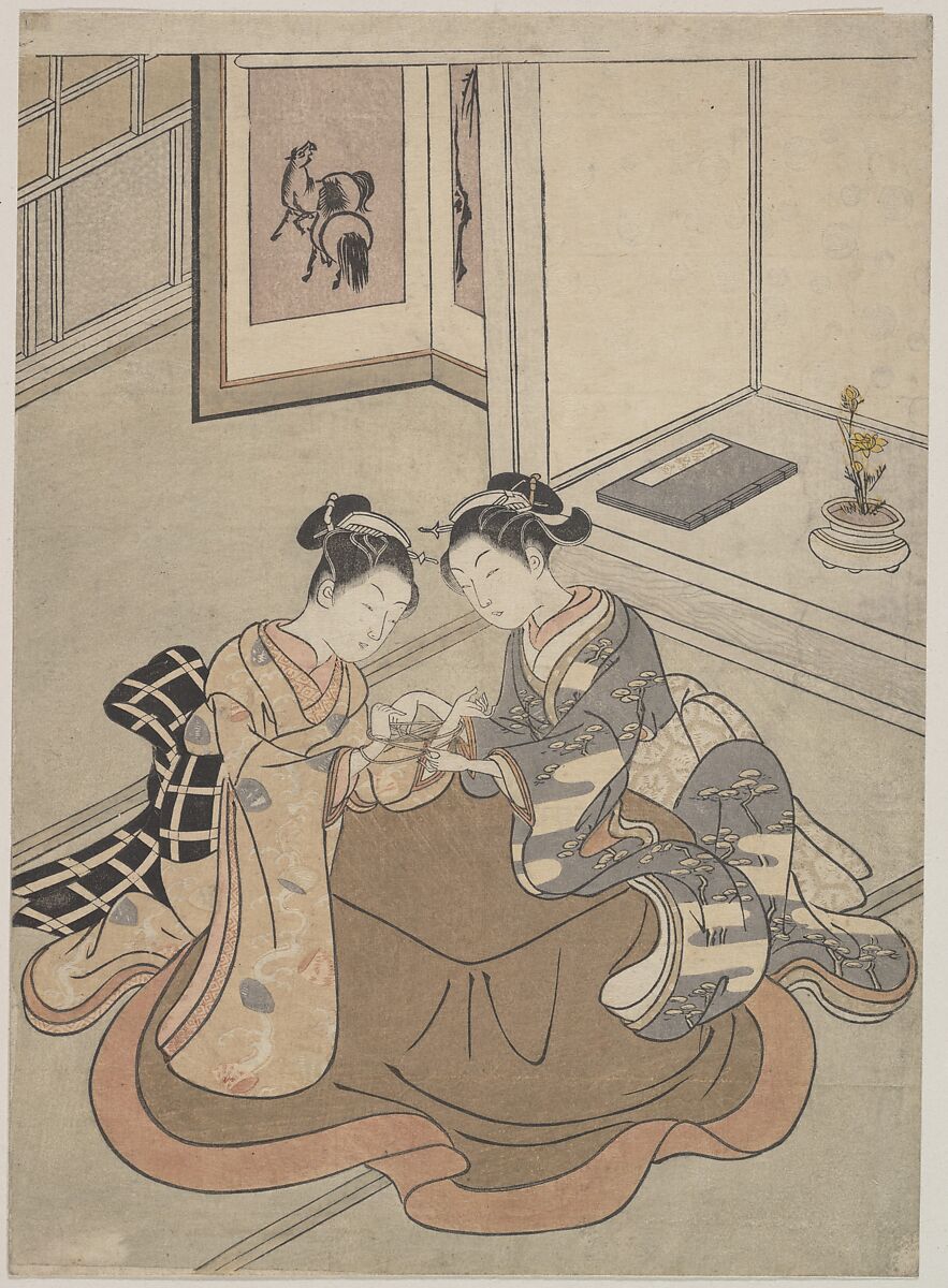 Two Young Women Seated by a Kotatsu Playing Cat's Cradle, Suzuki Harunobu (Japanese, 1725–1770), Woodblock print; ink and color on paper, Japan 