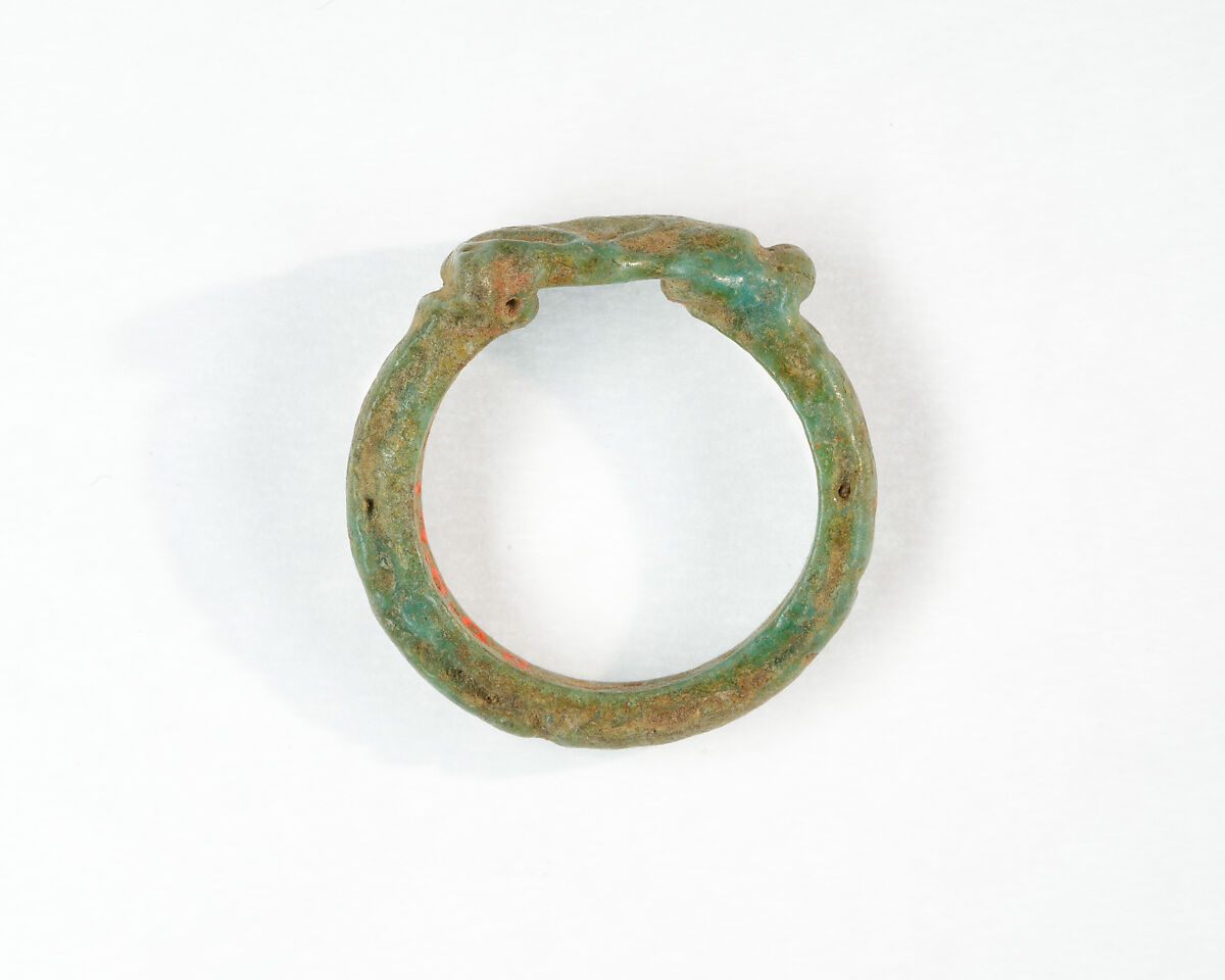 Ring, seated ape, Faience
