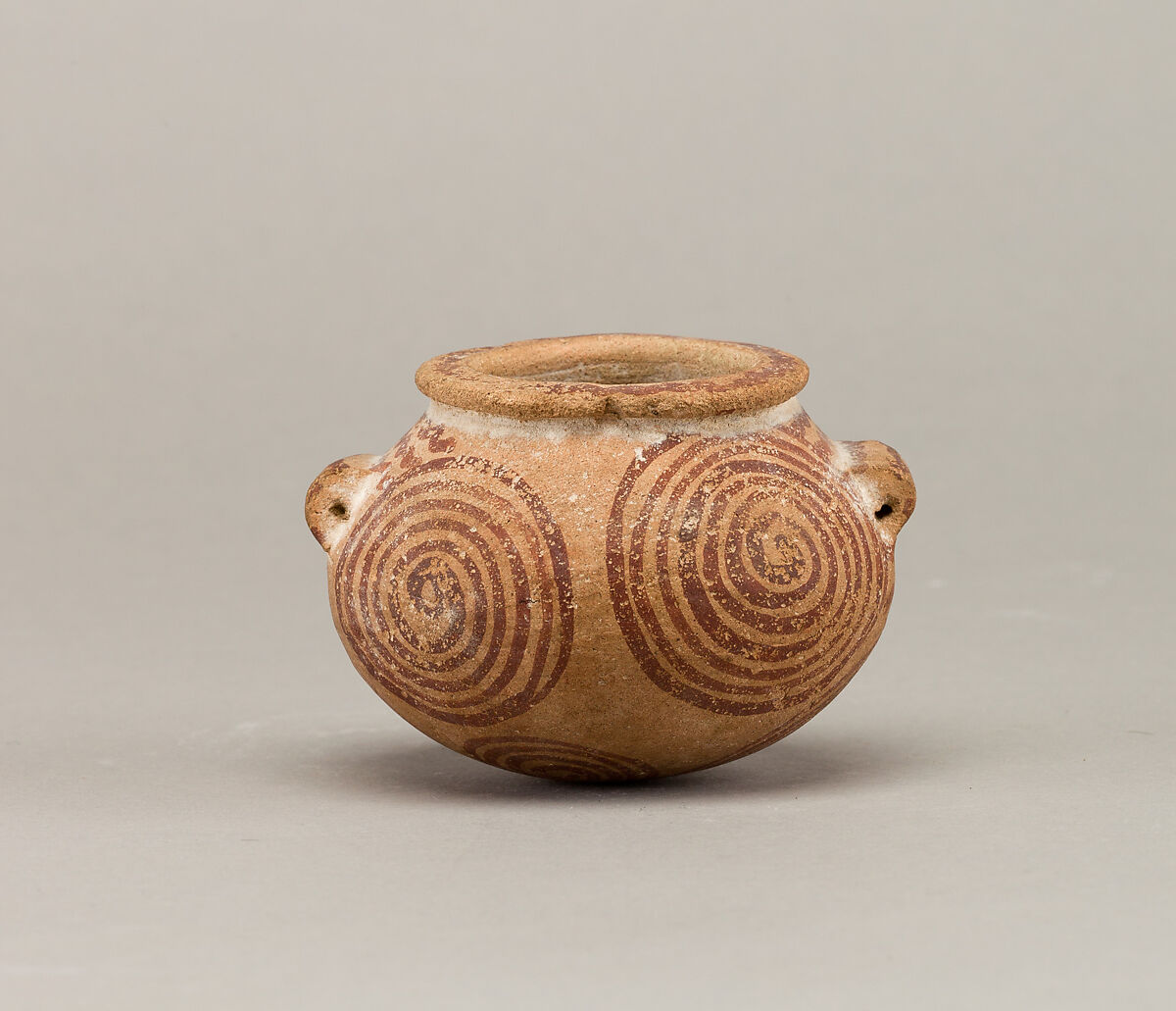Squat decorated ware jar depicting spirals, Pottery, paint