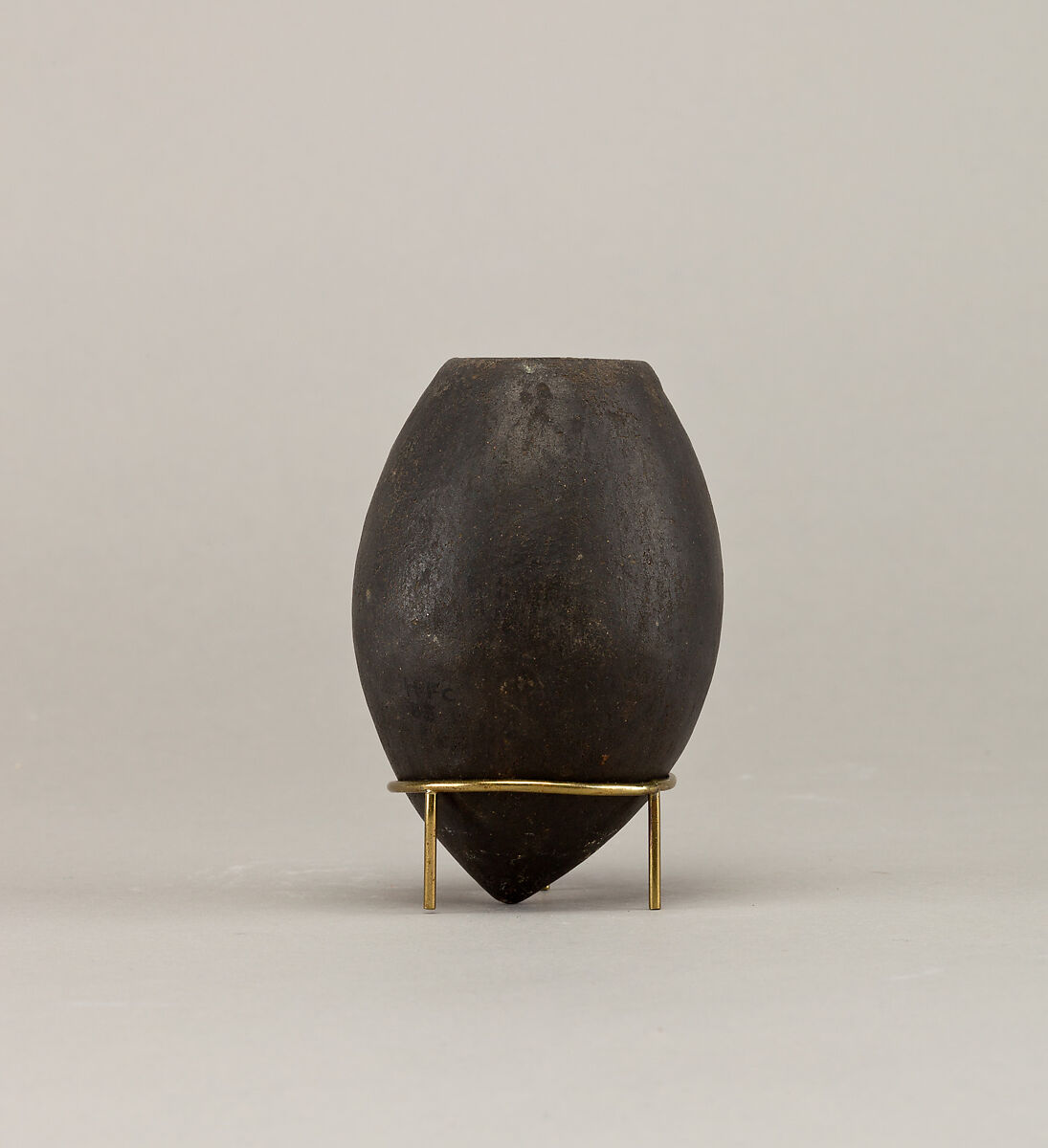 Black ware jar with pointed base, Pottery 