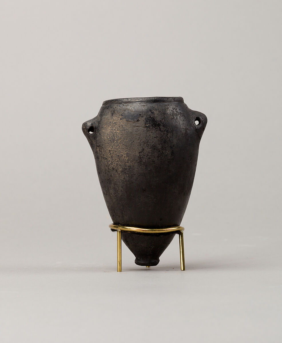 Black polish ware jar with lugs, Pottery