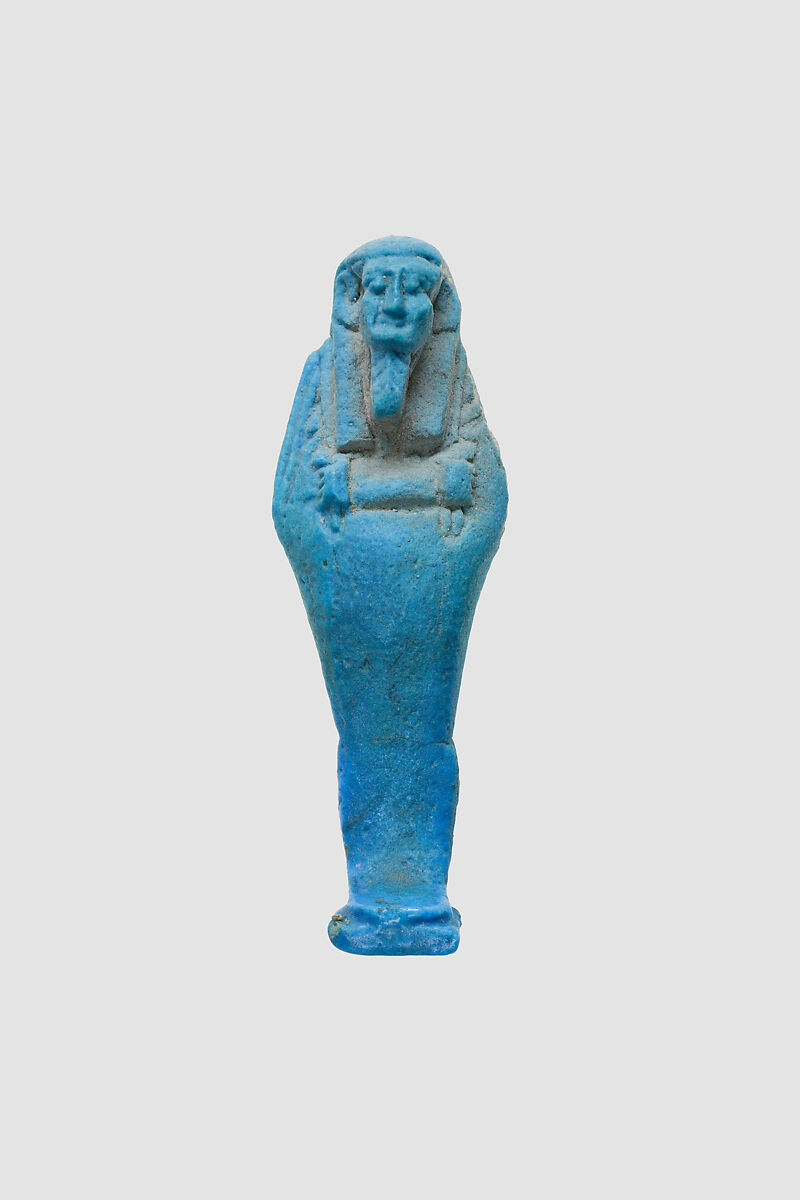 Uninscribed shabti from tomb of Nespekashuty, Faience 