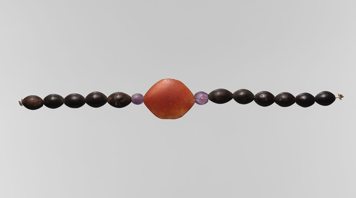 String of beads, barrel and one acacia, Amethyst, carnelian, hematite 