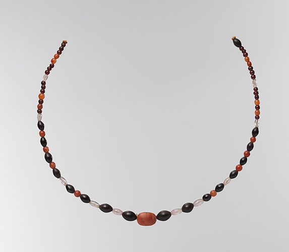 String of beads with scarab