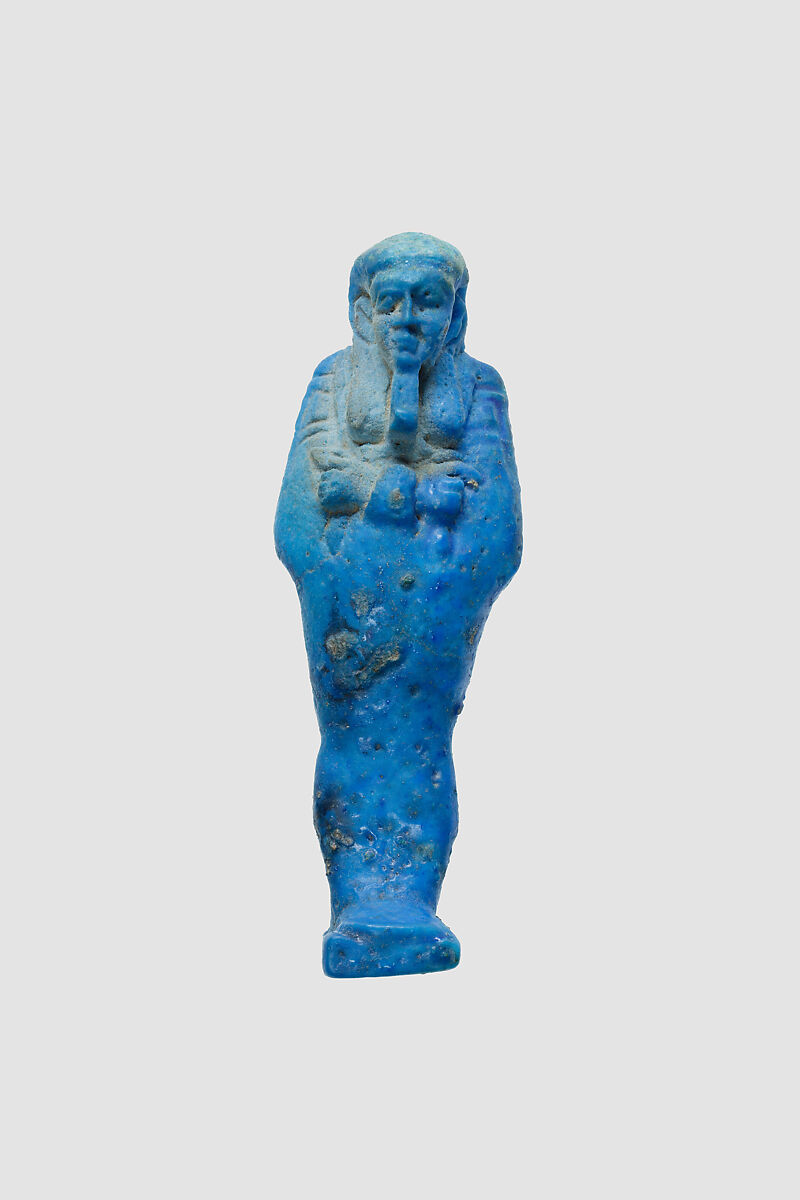 Uninscribed shabti from tomb of Nespekashuty, Faience 