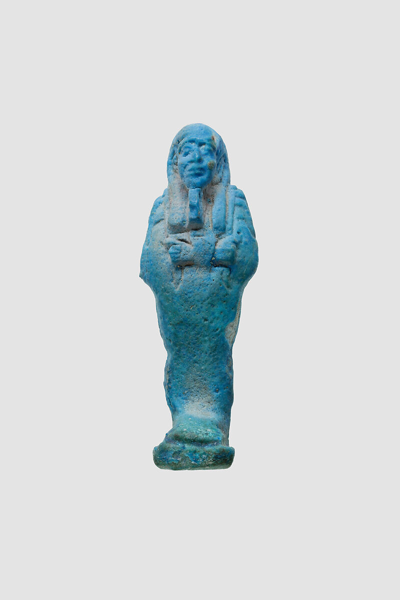 Uninscribed shabti from tomb of Nespekashuty, Faience 