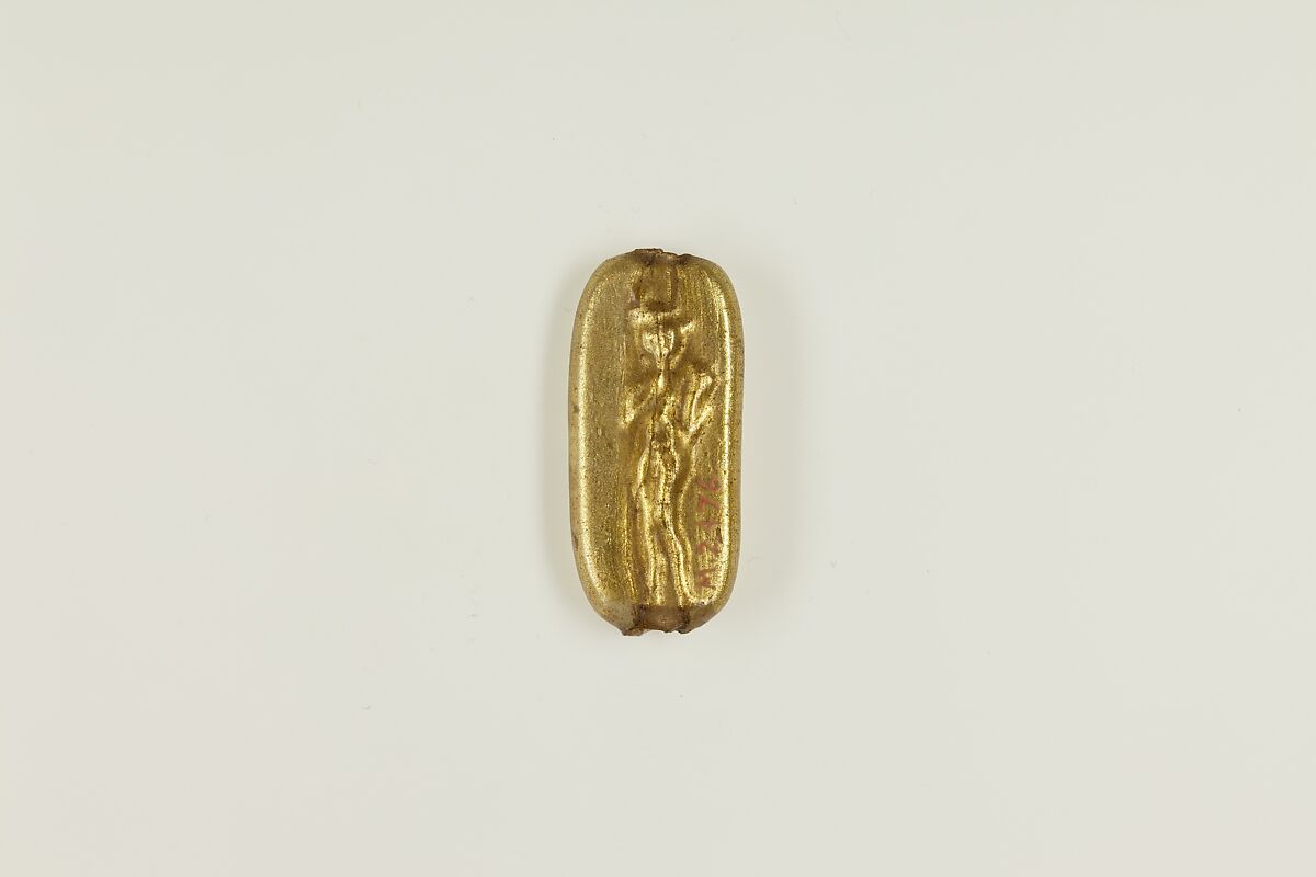 Bead with figure of Harpokrates, glass, gold foil 