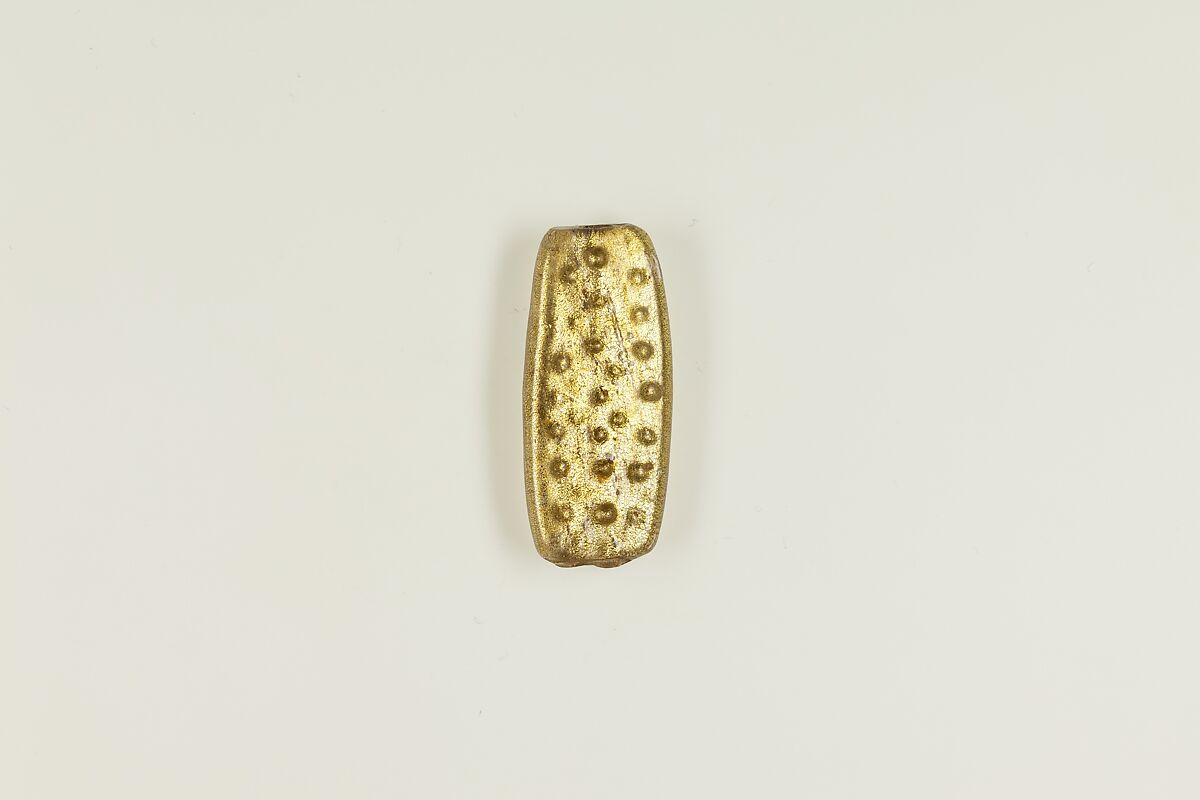 Bead with figure of Harpokrates, glass, gold foil