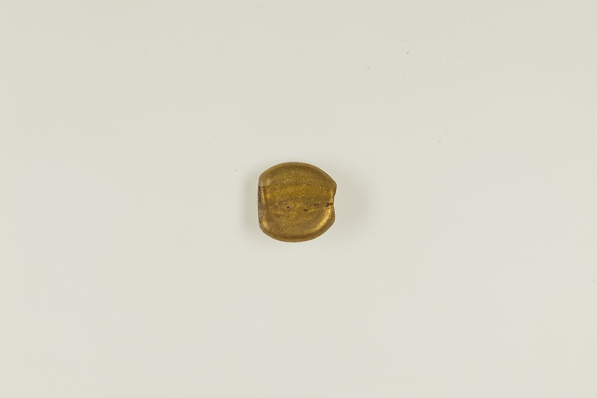 Bead with a jackal, glass, gold foil