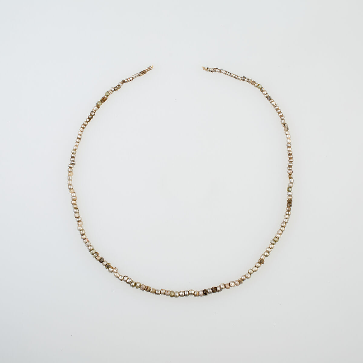 String of Beads, glass, gold foil 