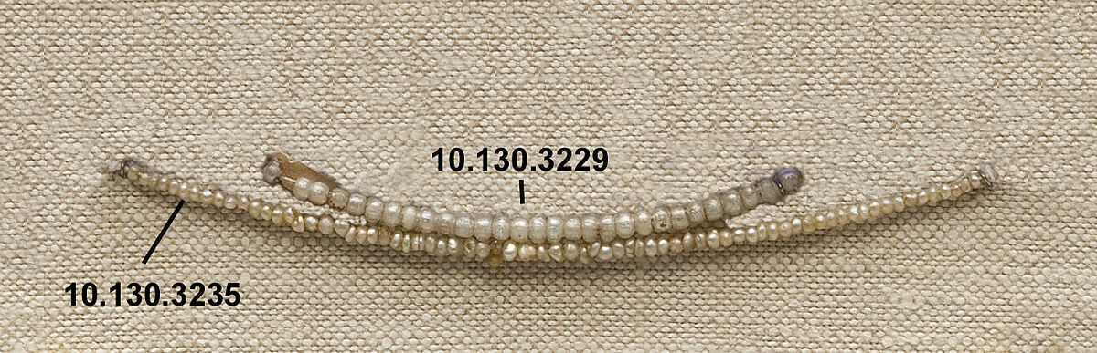 String of 29 Beads, Silvered glass