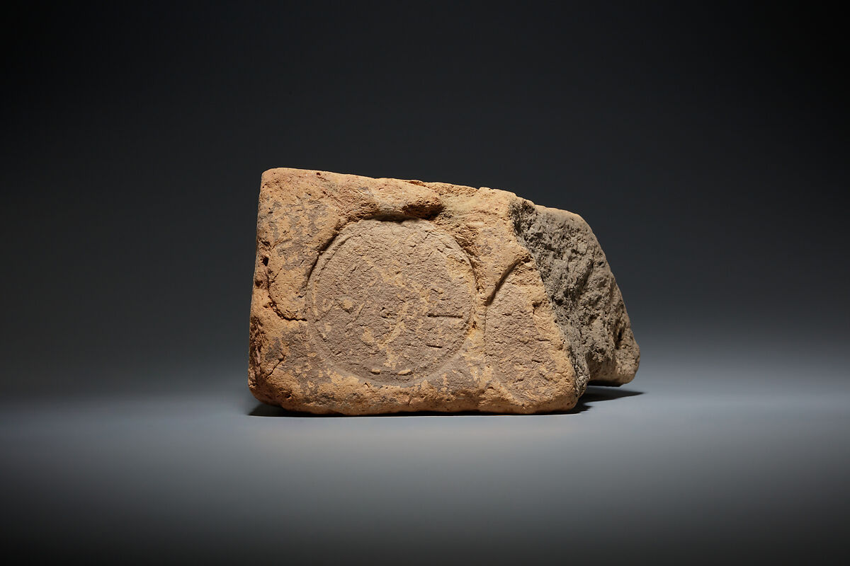 Brick Stamped with a Circular Seal, Pottery