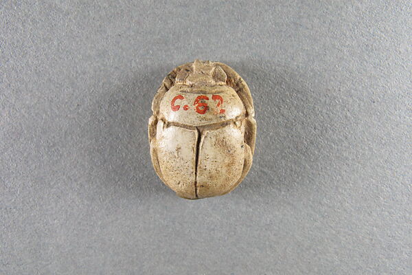 Scarab inscribed with the name of Unis, Faience