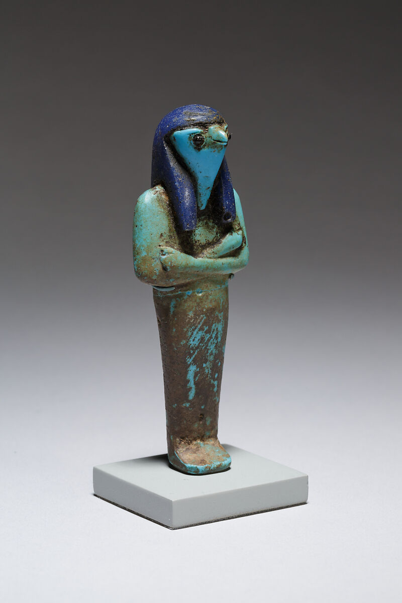 Funerary figure of Qebehsenuef, Glass, precious metal