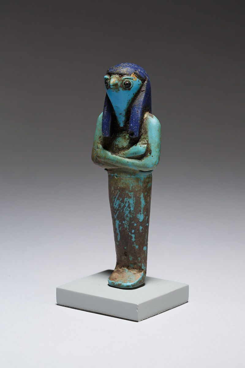 Funerary figure of Qebehsenuef, Glass, precious metal