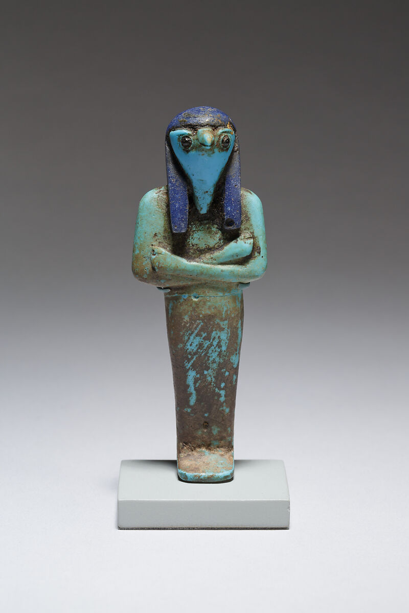 Funerary figure of Qebehsenuef, Glass, precious metal 