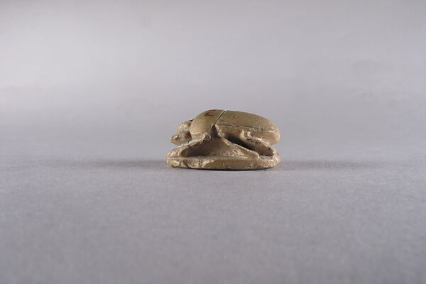 Scarab with sphinx and inscription, Faience