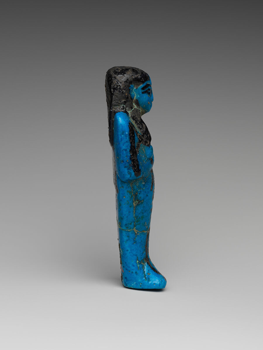 Shabti of the Adoratrice of Hathor Henettawy, wife of Painedjem I, Faience