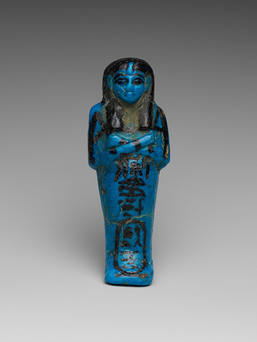 Shabti of the Adoratrice of Hathor Henettawy, wife of Painedjem I, Faience 