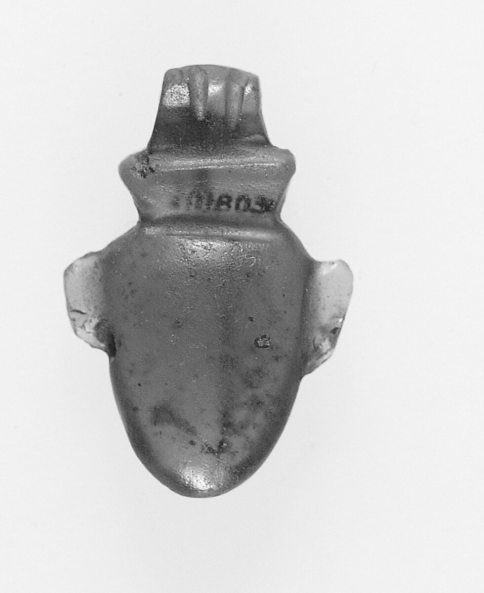 Heart amulet, Green glass