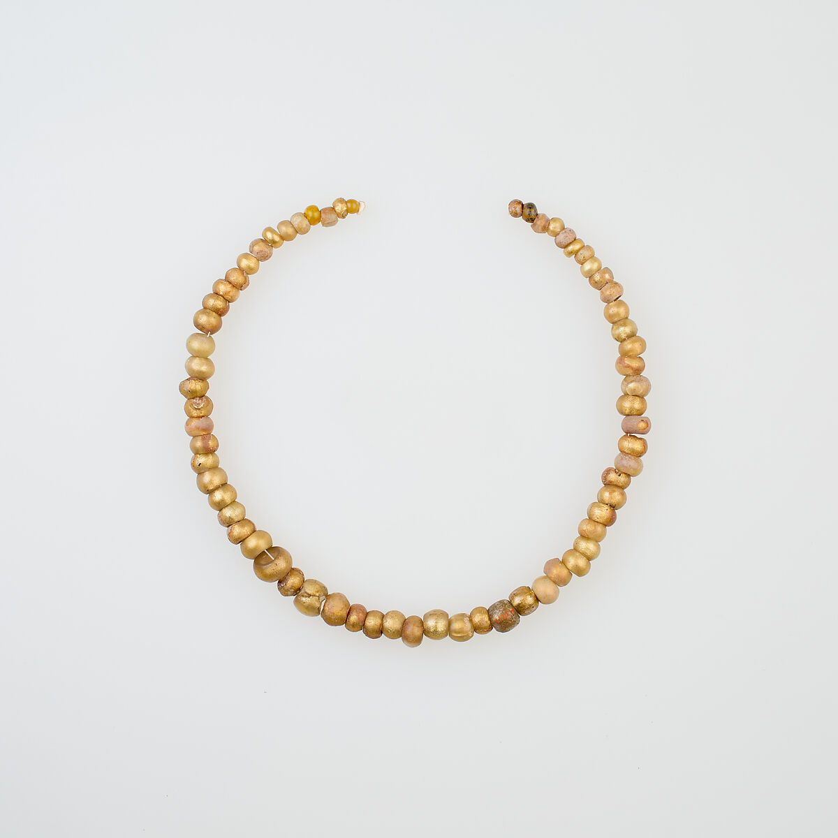 String of 65 Beads, glass, gold foil 
